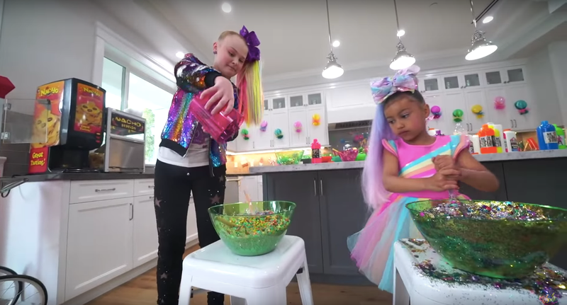 Illustration for article titled JoJo Siwa Babysits North West in Her Claire's Gift Shop Of a Home